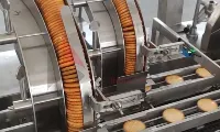 Multiplicador de carriles para clasificación de galletas