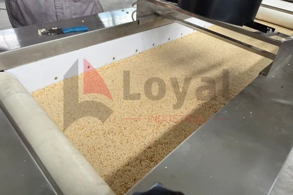 Sistema de prensado multirrodillo para barras de granola